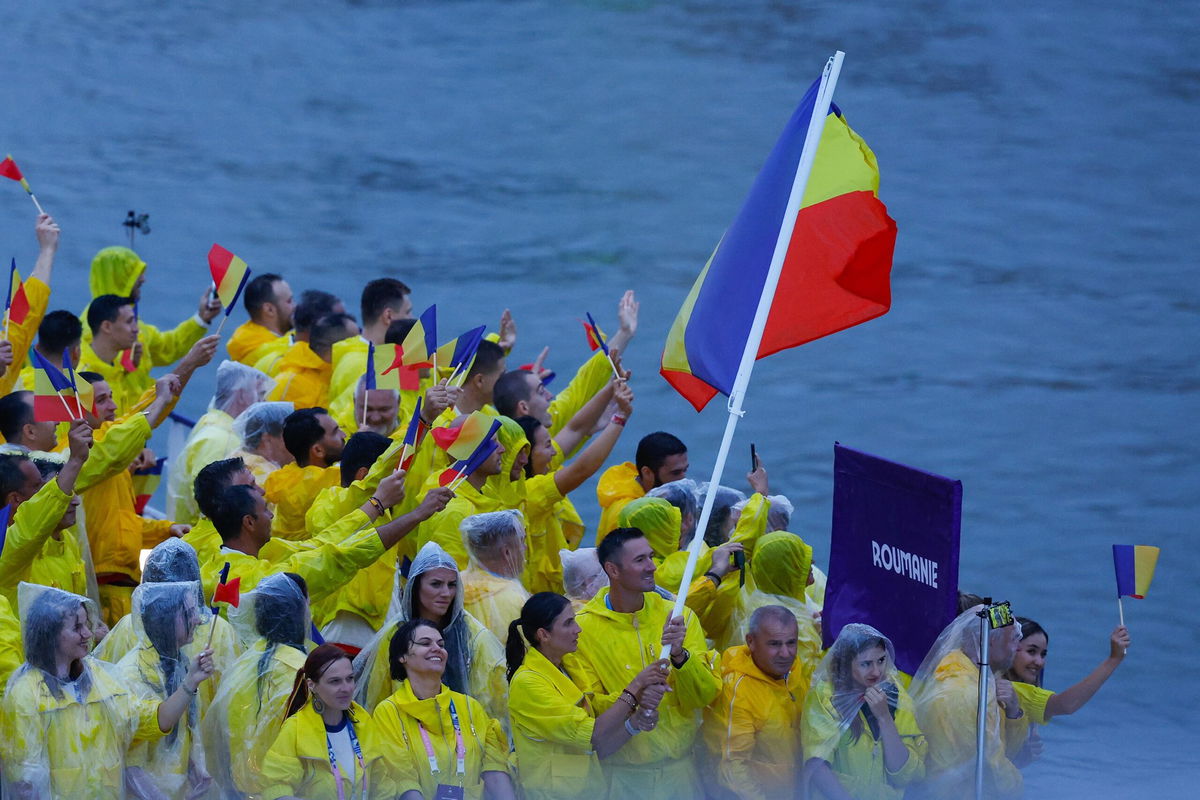 <i>Oscar J. Barroso/Europa Press/Getty Images) via CNN Newsource</i><br/>The delegation of Romania on a boat on the Seine River during the opening ceremony of the Paris 2024 Olympics Games on July 26.