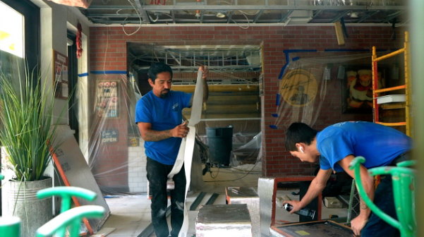 <i>WFTX via CNN Newsource</i><br/>Workers busy renovating the interior of La Trattoria in Naples after the ceiling collapsed