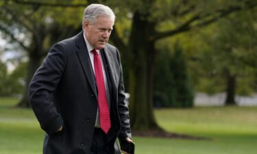 White House chief of staff Mark Meadows walks on the South Lawn of the White House in Washington