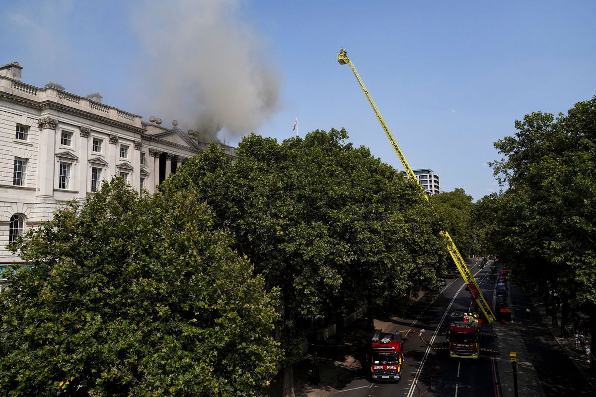 <i>Maja Smiejkowska/Reuters via CNN Newsource</i><br/>Smoke rises as firefighters work at the scene of a fire at Somerset House in London.