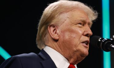 Former President Donald Trump speaks during a Turning Point USA Believers Summit conference at the Palm Beach Convention Center on July 26