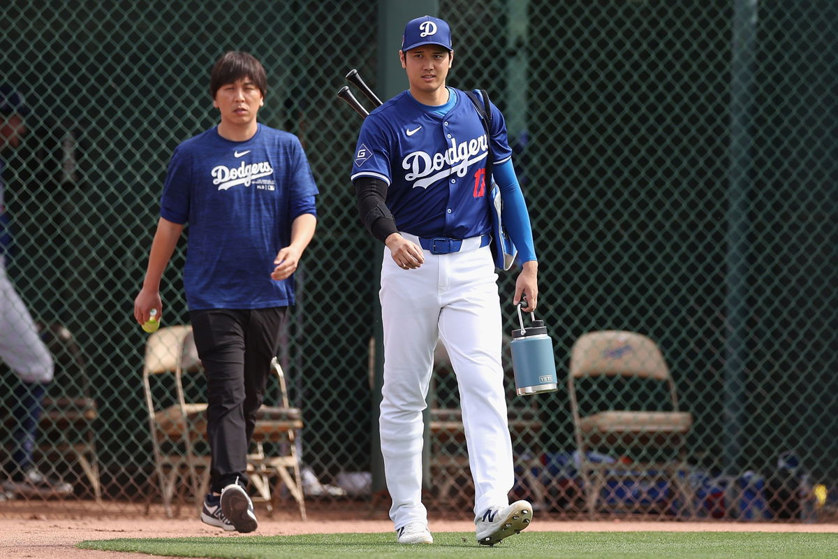 <i>Christian Petersen/Getty Images via CNN Newsource</i><br/>Shohei Ohtani #17 of the Los Angeles Dodgers and interpreter Ippei Mizuhara arrive to a game against the Chicago White Sox at Camelback Ranch on February 27