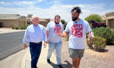 John King walks with Rural Arizona Action members in Pinal County