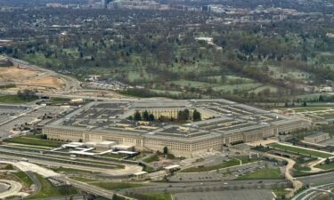 A contractor for the Defense Department was arrested Friday and charged with mishandling classified documents