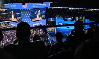 Content creator Carlos Eduardo Espina speaks at the United Center during the Democratic National Convention in Chicago on Wednesday