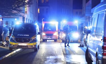 Police and ambulances near the scene where people were killed and injured in an attack at a festival in Solingen.