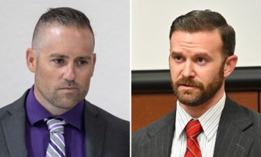 A federal judge has dismissed felony charges against two former Louisville Metro Police Department detectives