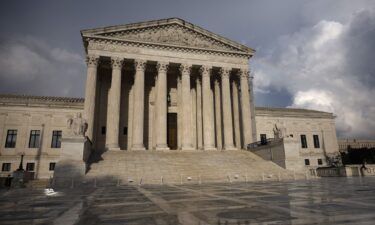 Passing storm clouds are seen over the U.S. Supreme Court on July 30