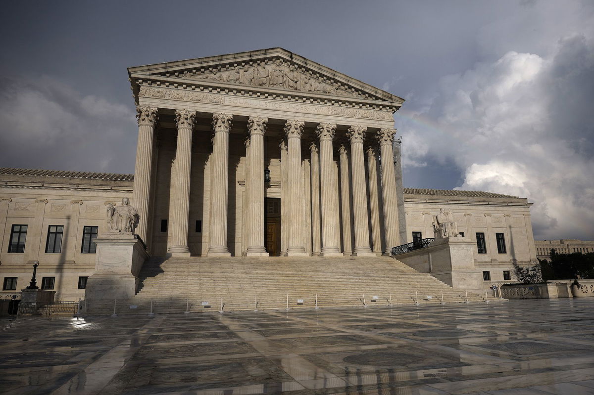 <i>Kevin Dietsch/Getty Images/File via CNN Newsource</i><br/>Passing storm clouds are seen over the U.S. Supreme Court on July 30