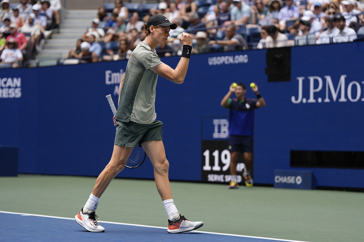 <i>Julia Nikhinson/AP via CNN Newsource</i><br/>Jannik Sinner celebrates winning against Alex Michelsen at the US Open.