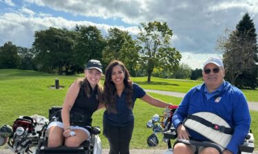 Adriana Mendez smiles with Hope and Todd