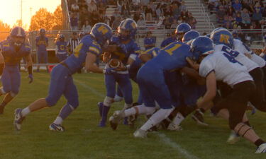 Ririe football players attempt to push a run up the middle but meet resistance from Firth players.