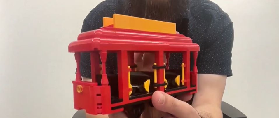 <i>KDKA via CNN Newsource</i><br/>Creator Matt Smith came up with a miniature version of the iconic cherry red trolley after LEGO passed on mass-producing his nearly 2