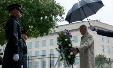 President Joe Biden participates in a wreath-laying ceremony commemorating the 21st anniversary of the crash of American Airlines Flight 77 into the Pentagon during the September 11th terrorist attacks at the National 9/11 Pentagon Memorial on September 11