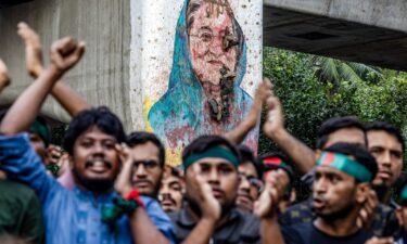 Family members of people "disappeared" campaign for their return outside the Shaheed Minar in Dhaka on 11 August 2024.