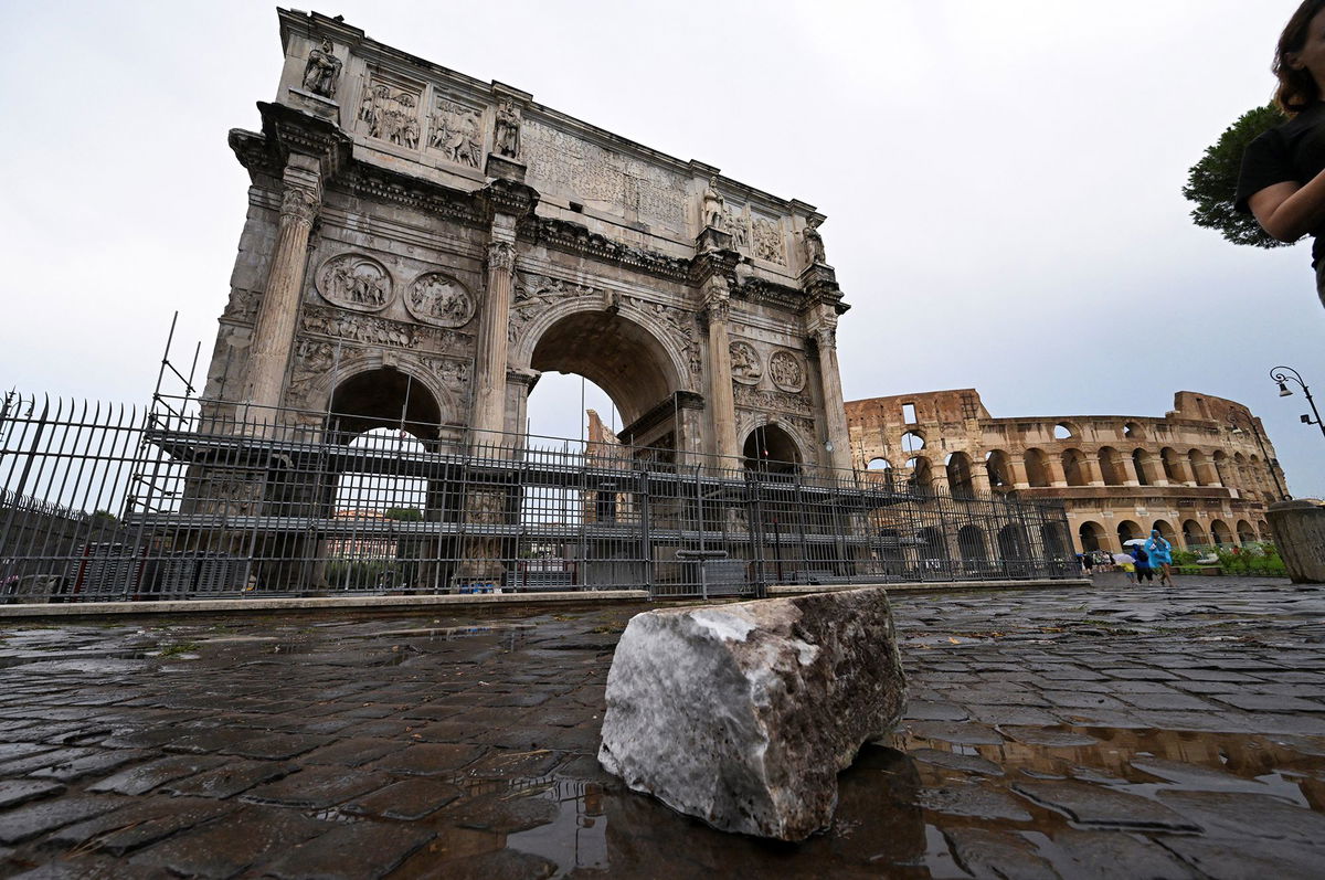 <i>Andrew Medichini/AP via CNN Newsource</i><br/>Workers collected fragments and secured the area around the monument