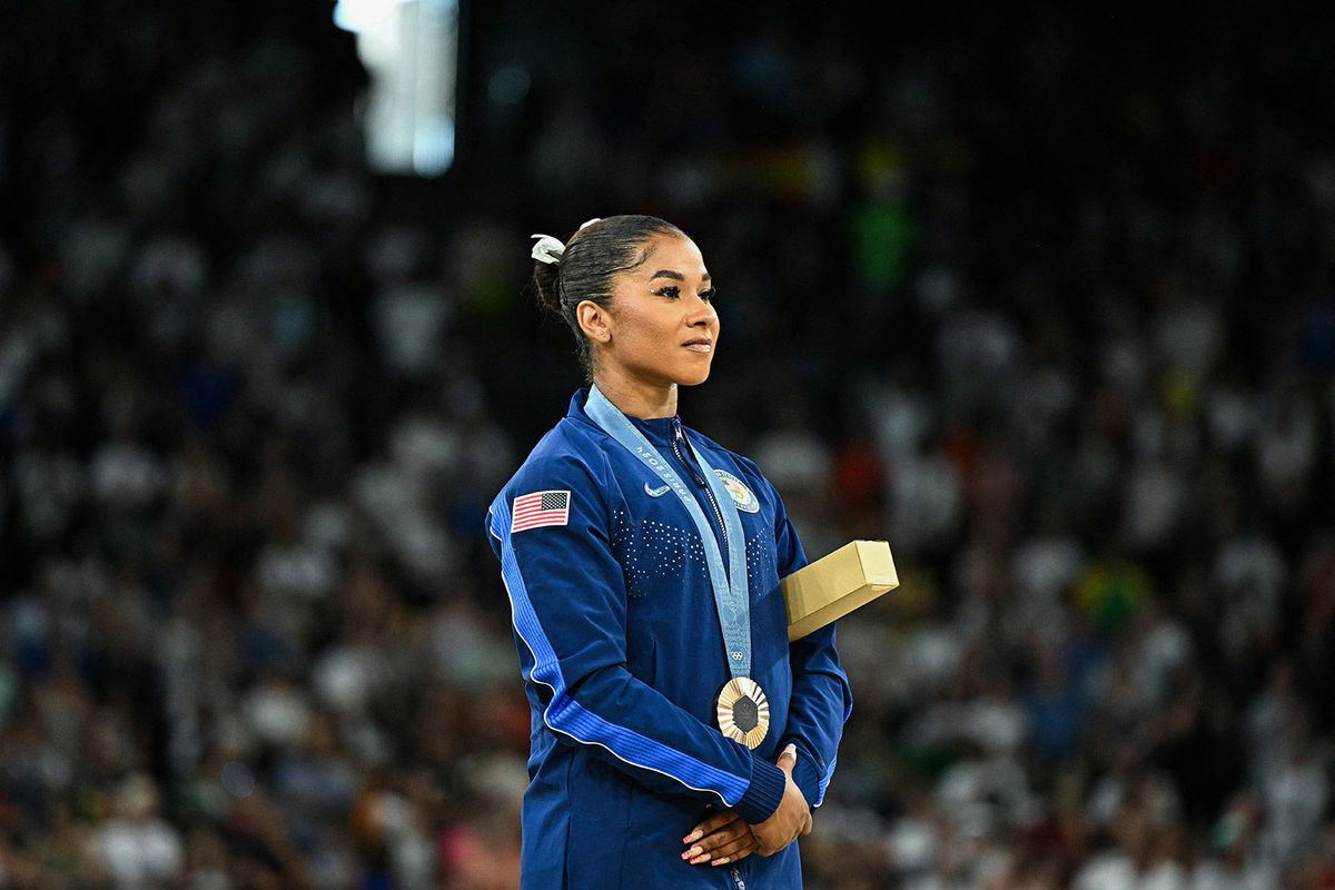 <i>Gabriel Bouys/AFP/Getty Images via CNN Newsource</i><br/>American gymnast Jordan Chiles poses during the women's floor exercise medal ceremony at the Paris 2024 Olympic Games.