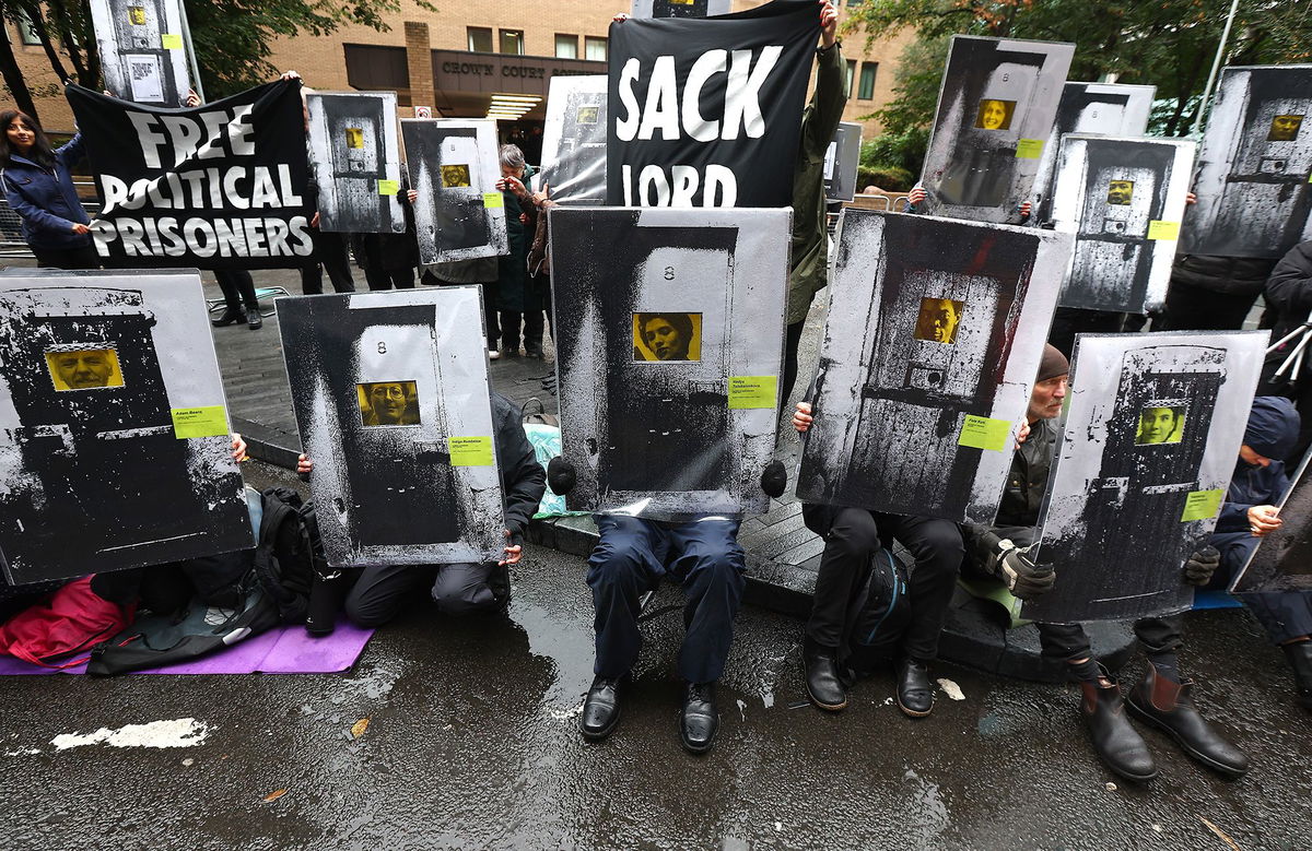 <i>Peter Nicholls/Getty Images via CNN Newsource</i><br/>Supporters of Phoebe Plummer and Anna Holland from Just Stop Oil protest in front of Southwark Crown Court on September 27