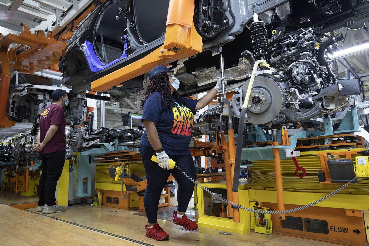 <i>Bill Pugliano/Getty Images via CNN Newsource</i><br/>A 2021 Jeep Grand Cherokee L is assembled at the Stellantis Detroit Assembly Complex-Mack in June 2021 in Detroit.