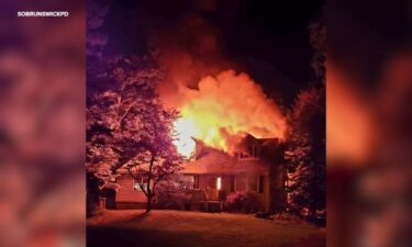 Law enforcement sources say a man who got into an argument with his girlfriend set her parents' home on fire in South Brunswick early Tuesday morning.