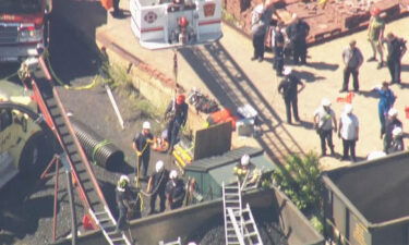 Crews pulled a man to safety after he was trapped in coal train car in Bridgewater.