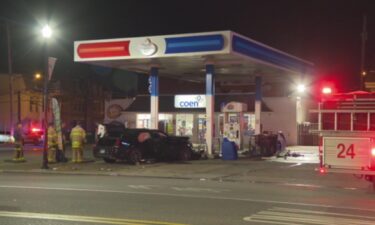 The man driving the vehicle that crashed into the pumps was said to be fighting with officers in the street. A police officer was taken to the hospital to be treated for a hand injury.