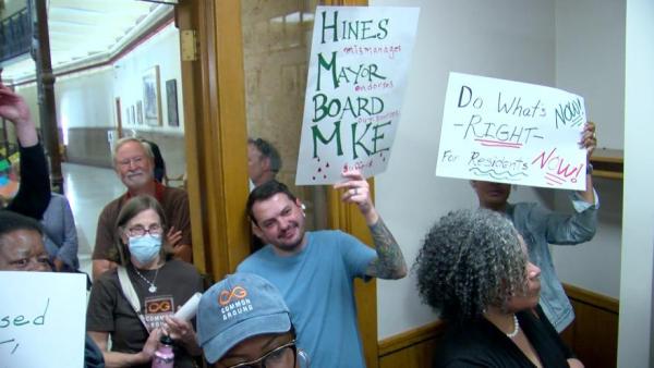 <i>WDJT via CNN Newsource</i><br/>The demonstrators marched into the Johnson's office after the vote and demanded to meet with either the mayor or a senior staff member.