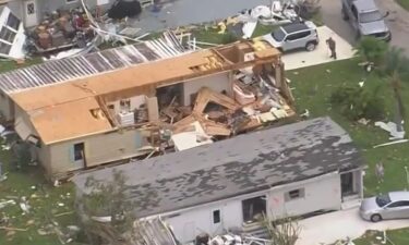 Beleaguered homeowners around Palm Beach Gardens are coping with some massive damage from a tornado that touched down on Wednesday.