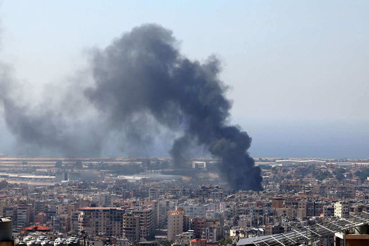 <i>Mohamed Azakir/Reuters via CNN Newsource</i><br/>Smoke rises in Beirut's southern suburbs after a strike