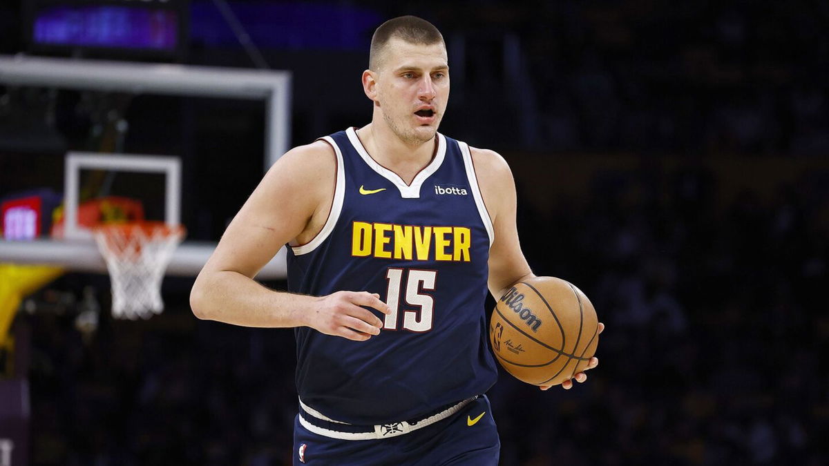 <i>Fadel Senna/AFP/Getty Images via CNN Newsource</i><br/>Jokić looks to pass in the NBA preseason game between the Nuggets and the Celtics.