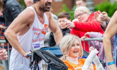 Actor Colin Farrell ran the final 4 kilometers of the Irish Life Dublin Marathon 2024 while pushing close friend Emma Fogarty.