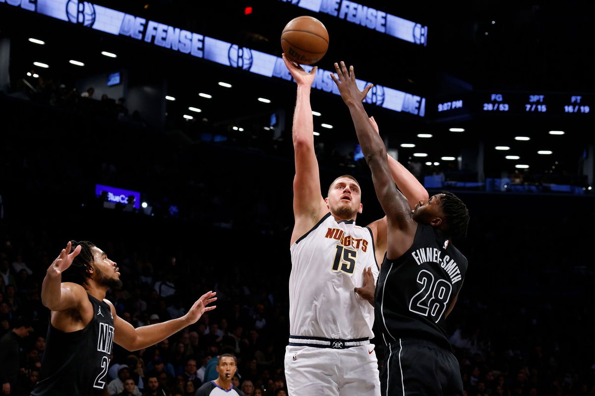 <i>Jason DeCrow/AP via CNN Newsource</i><br/>Nikola Jokić put up a historic stat line in the Nuggets' in over the Nets.