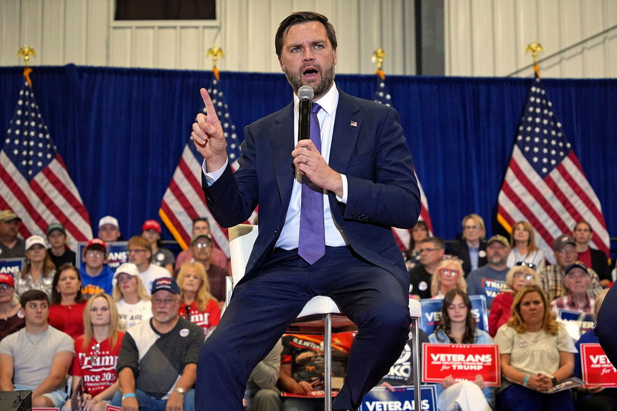 <i>Gene J. Puskar/AP via CNN Newsource</i><br/>Republican vice presidential nominee JD Vance speaks during a town hall meeting at the Bedford County Airport in Bedford