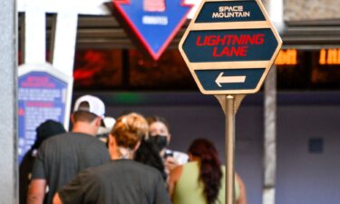 Folks line up in the Lightning Lane at Space Mountain at Disneyland in California in August 2022.