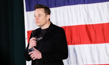 Elon Musk participates in a town hall-style meeting to promote early and absentee voting at Ridley High School on October 17