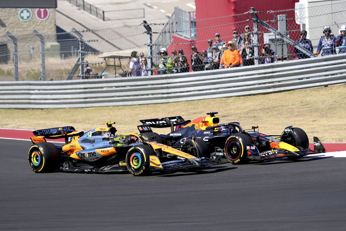 <i>Eric Gay/AP via CNN Newsource</i><br/>Norris (left) and Verstappen race through a turn during the US Grand Prix.