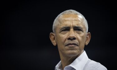 Former President Barack Obama attends a rally in Madison