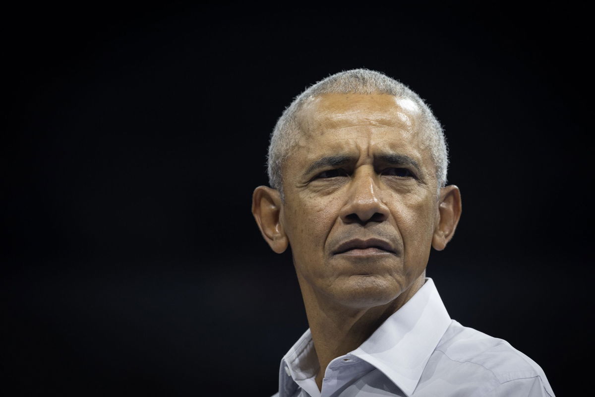 <i>Scott Olson/Getty Images via CNN Newsource</i><br/>Former President Barack Obama attends a rally in Madison