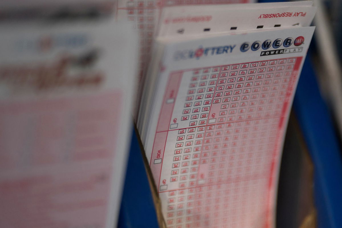 <i>Nathan Howard/Reuters via CNN Newsource</i><br/>Powerball tickets are seen at a store