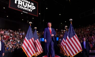 Republican presidential nominee and former President Donald Trump arrives at a campaign rally in Tempe