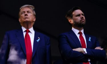 Former US President and Republican presidential candidate Donald Trump (L) and US Senator from Ohio and Republican vice presidential candidate J.D. Vance attend a remembrance ceremony on the 23rd anniversary of the September 11 terror attack on the World Trade Center at Ground Zero