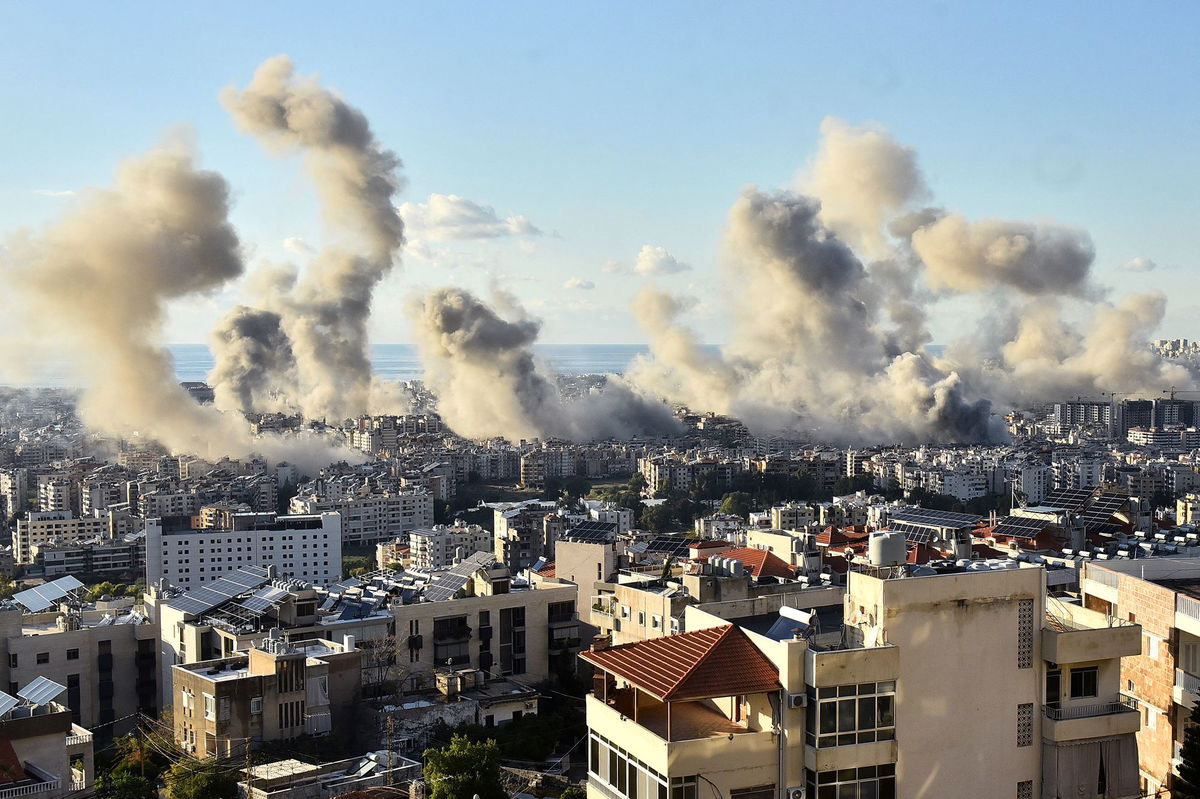 Smoke billows above Beirut's southern suburbs after an Israeli airstrike on Tuesday.