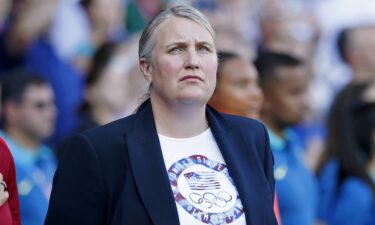 United States head coach Emma Hayes looks on during the national anthem before the women's soccer gold medal match during the Paris 2024 Olympic Summer Games at Parc des Princes.