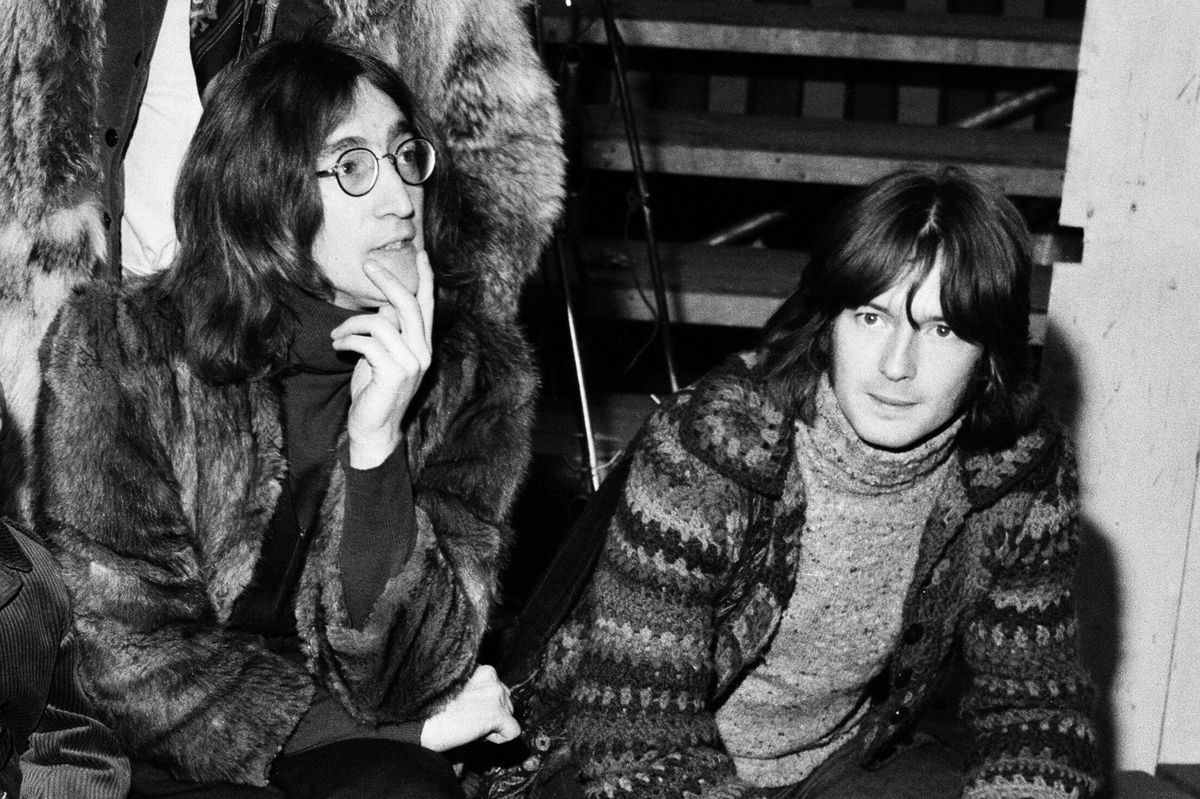 John Lennon (left) told Eric Clapton (right) how much he admired his music.