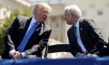 Donald Trump speaks with then-Attorney General Jeff Sessions as they attend the National Peace Officers Memorial Service in 2019 on the West Lawn of the US Capitol in Washington