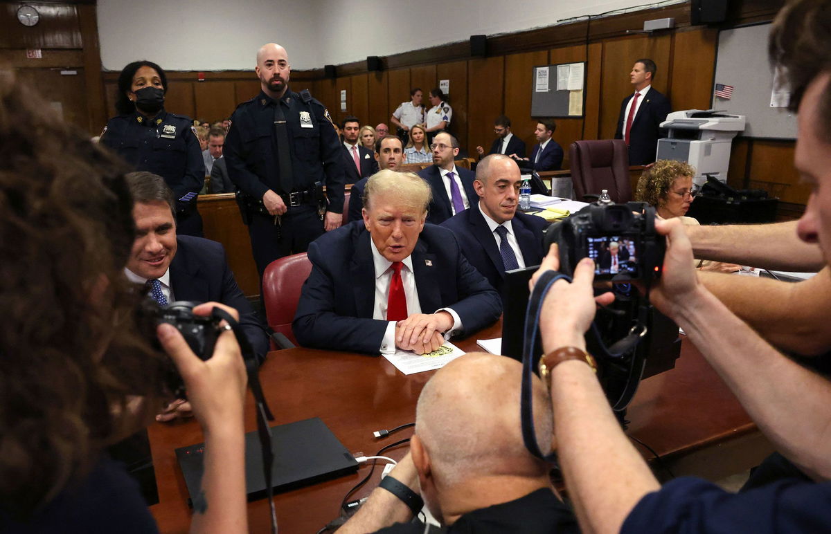 <i>Spencer Platt/Getty Images via CNN Newsource</i><br/>Former President Donald Trump appears in court with his lawyers Todd Blanche