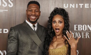 Jonathan Majors smiles as Meagan Good flashes her engagement ring at the 2024 EBONY Power 100 Gala at Nya Studios in Los Angeles on November 17. Jonathan Majors and Meagan Good have announced their engagement at the same annual event where they met two years ago.