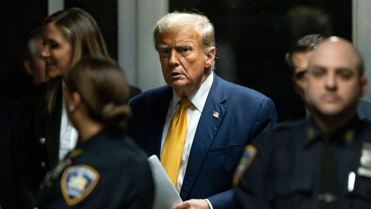 <i>Justin Lane/Pool/Getty Images via CNN Newsource</i><br/>Former US President Donald Trump leaves the courtroom at the end of the day's proceedings in his criminal trial for allegedly covering up hush money payments at Manhattan Criminal Court on May 14 in New York City.