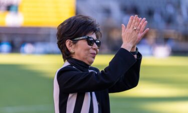 Washington Spirit owner Michele Kang waves to the crowd during a NWSL playoff semifinal game between NJ/NY Gotham FC and Washington Spirit at Audi Field on November 16. Kang has pledged $30 million to US Soccer.