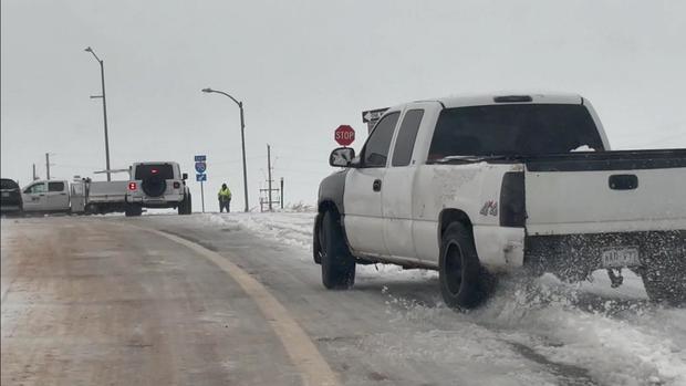 <i>KCNC via CNN Newsource</i><br/>A truck spins out on an Interstate 70 ramp in eastern Colorado on Thursday.